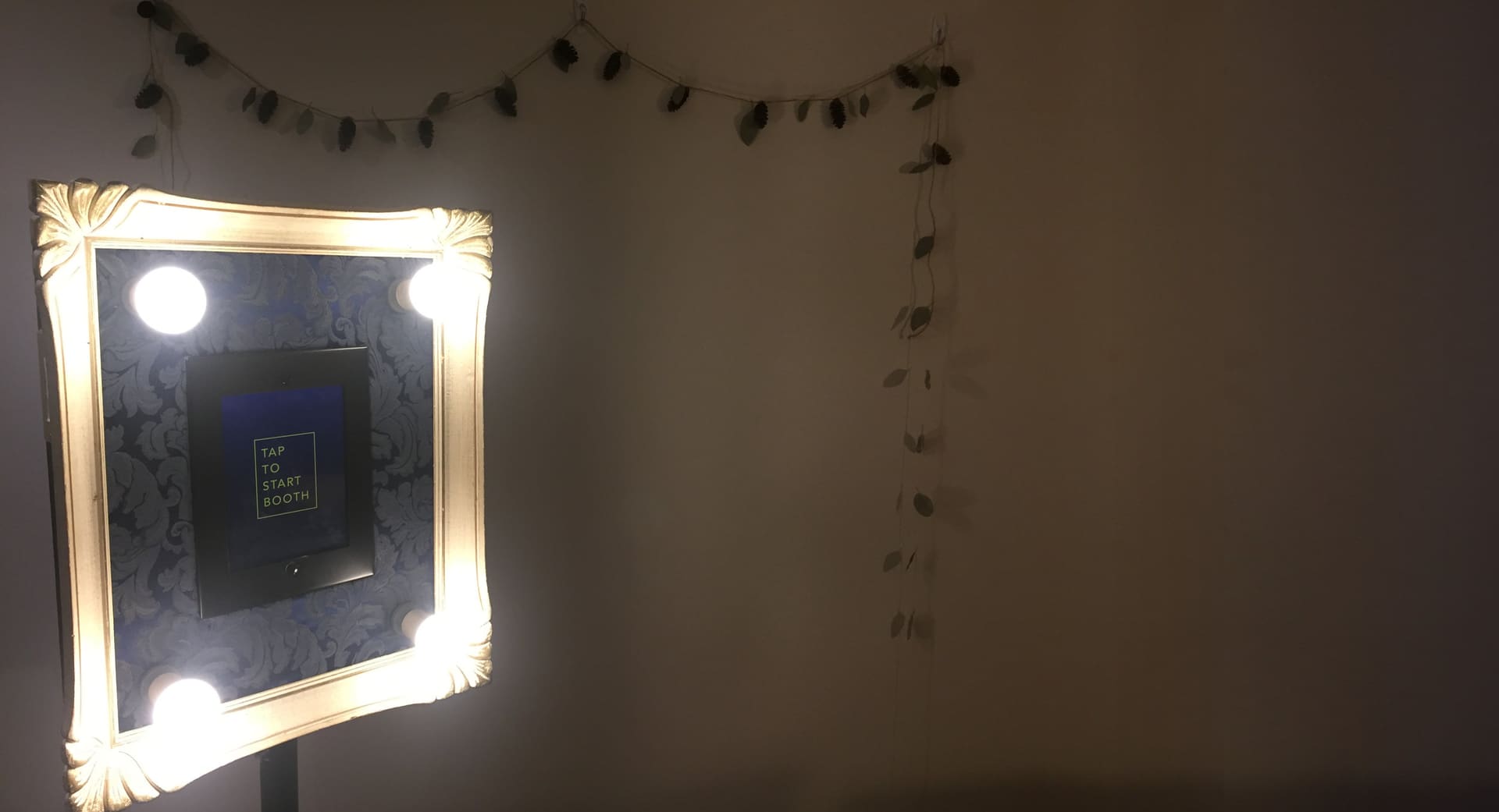 London Photo Booth lit up and ready, showing Tap to Start